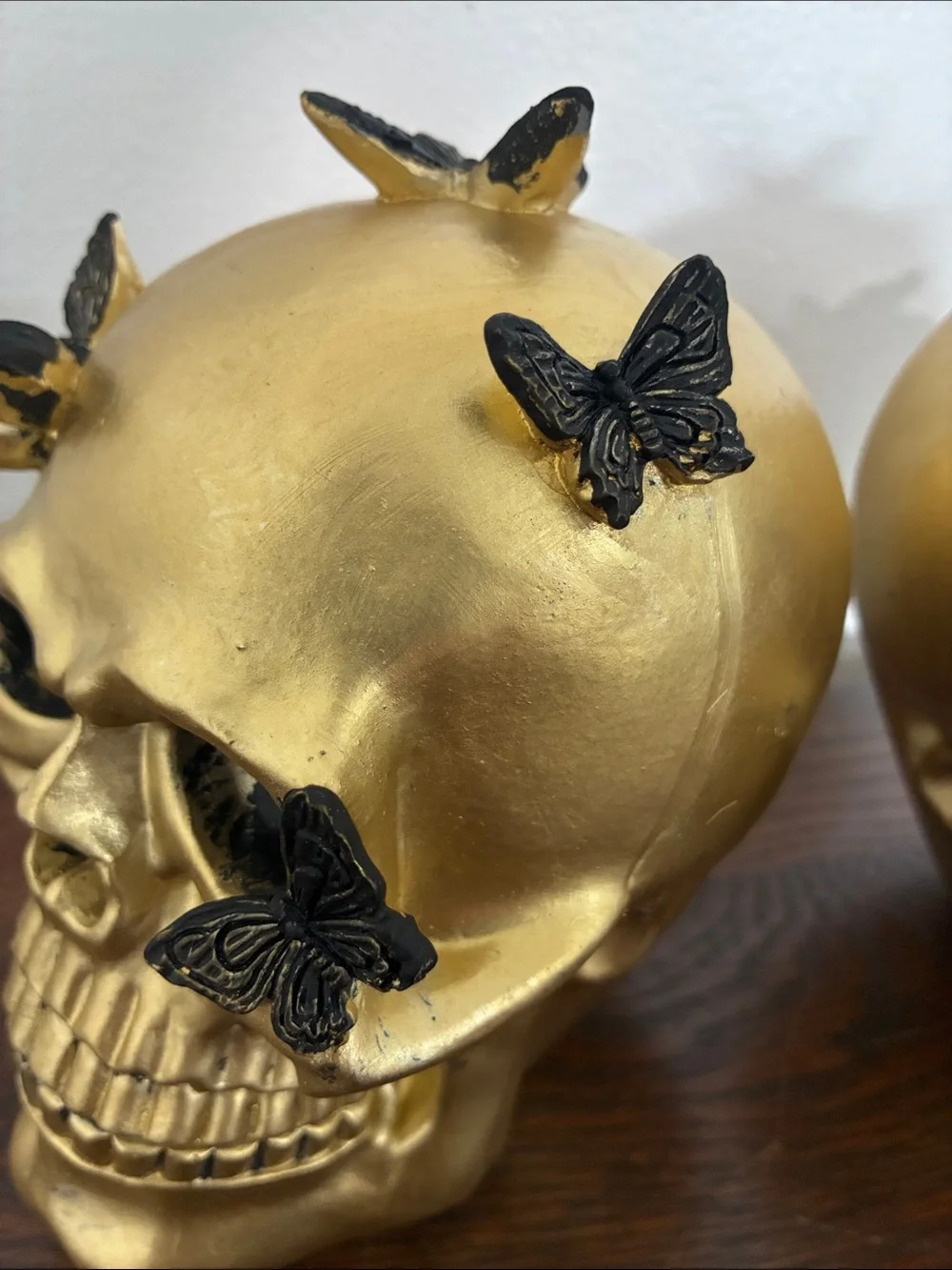 NWT- Set of 2- STUNNING- Gold Skull Statues with Black Butterflies Accents